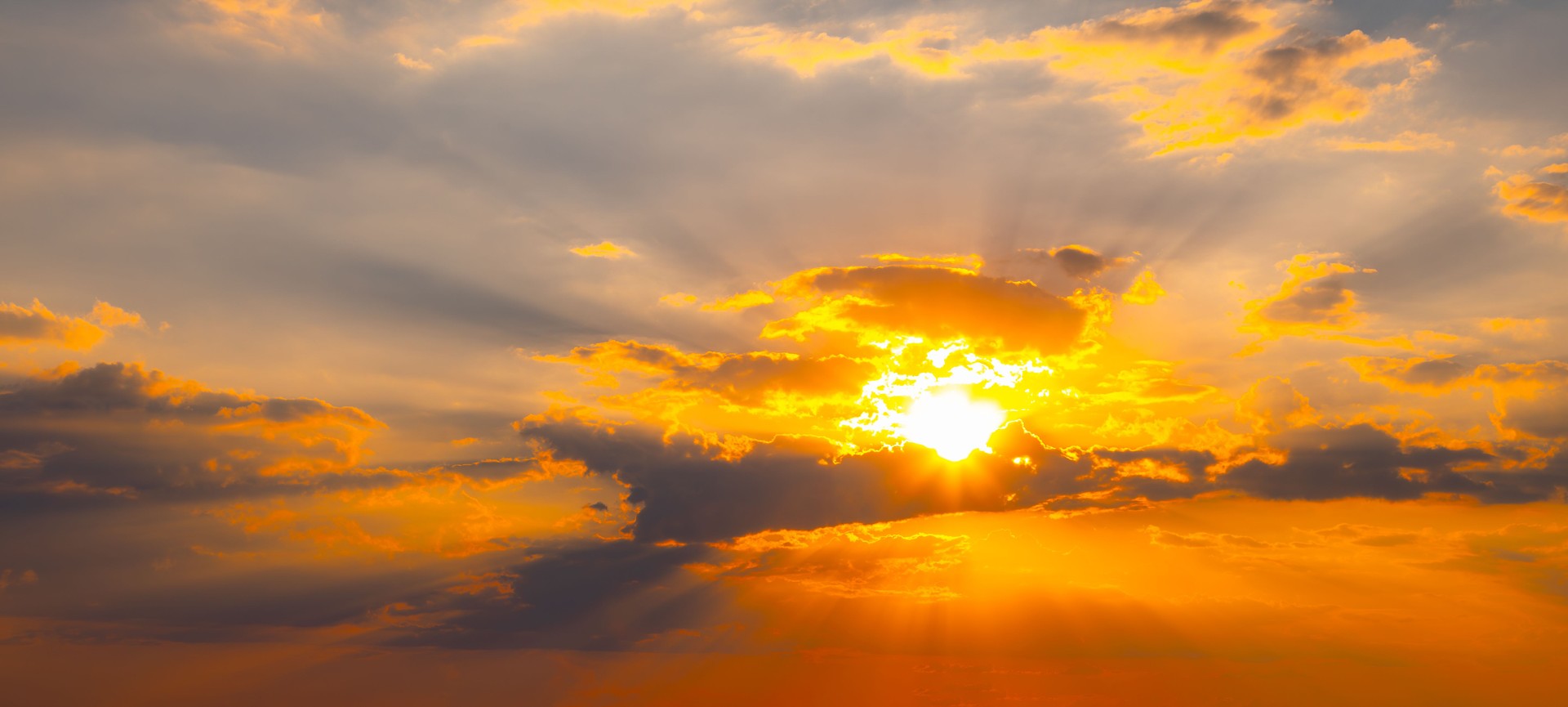 Backgrounds of colorful and beautiful sunsets or sunrises with clouds with sunlight on dramatic sky texture